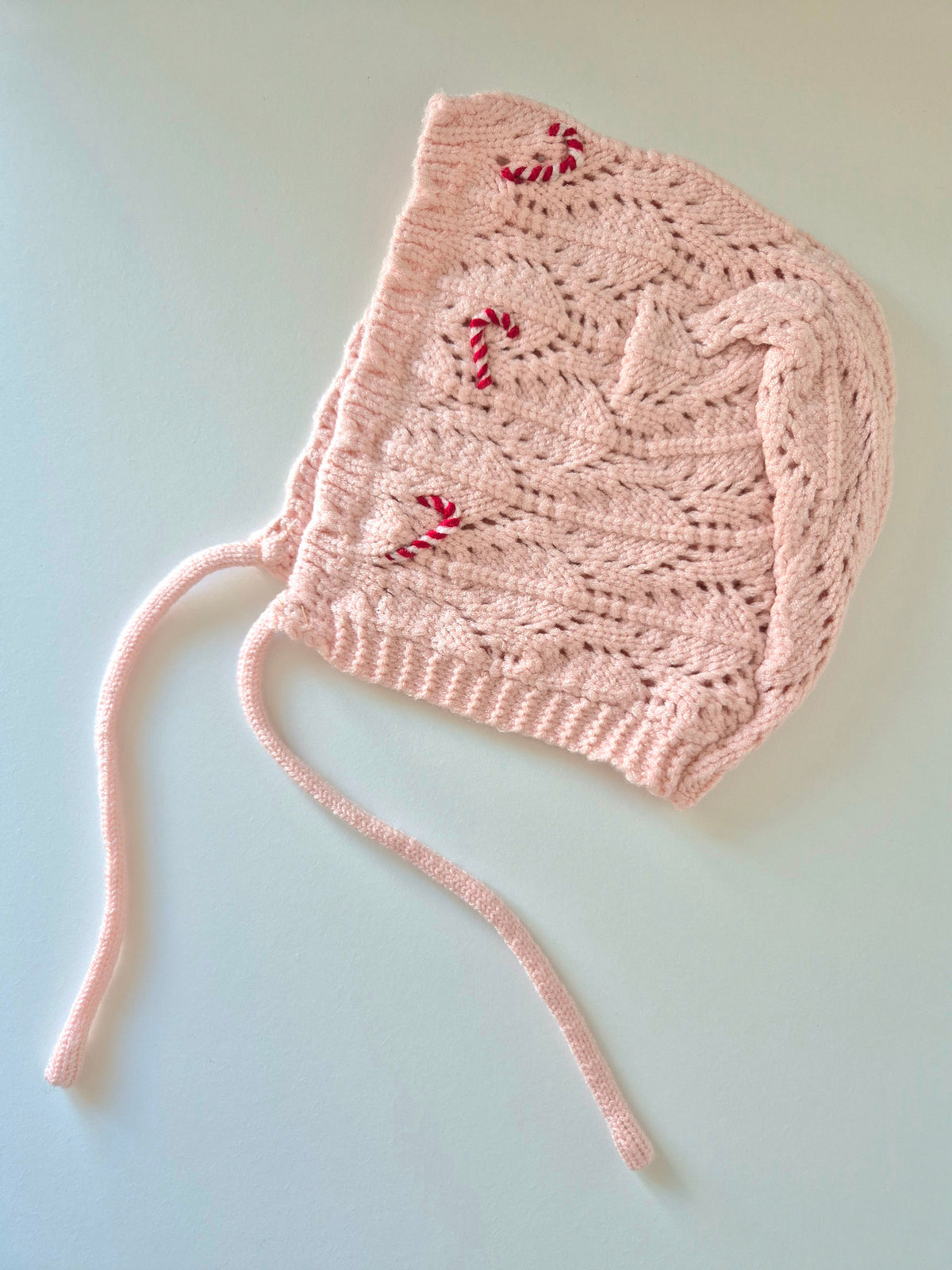 Knitted baby bonnet