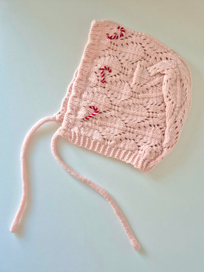 Knitted baby bonnet