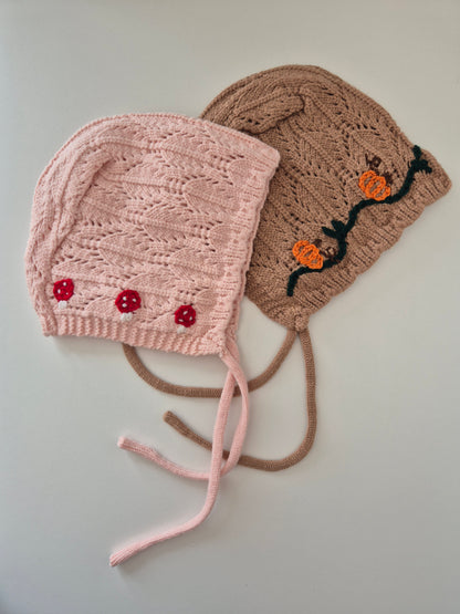 Knitted baby bonnet